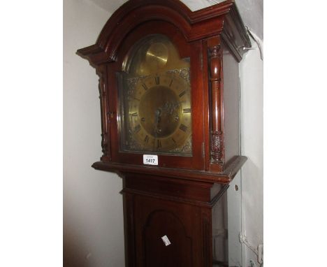 Mid 20th Century mahogany Grandmother clock with a brass dial, silvered chapter ring, Arabic and Roman numerals and a three t