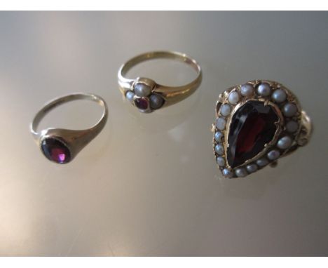 9ct Gold dress ring set large garnet, together with two others