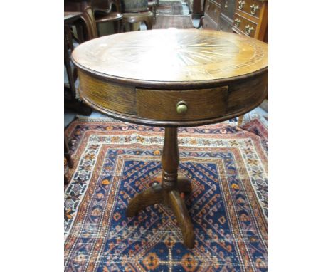 Drum form pedestal table, the circular specimen wood inlaid top with key pattern crossbanding, the oak frieze with a single d