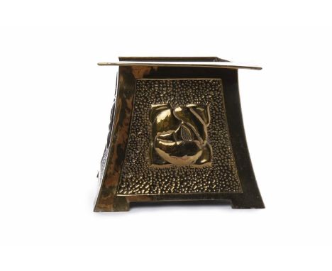 BRASS PLANTER IN THE ARTS & CRAFTS MANNERof spreading square form, with four beaten panels embossed with Glasgow-style roses,