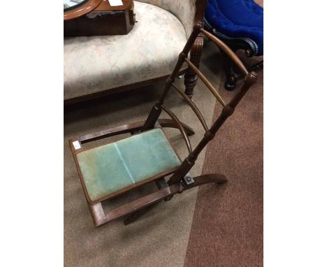 EARLY 20TH CENTURY MAHOGANY FOLDING CAMPAIGN CHAIRwith ladder back and bamboo-effect spindles, with padded seat upholstered i