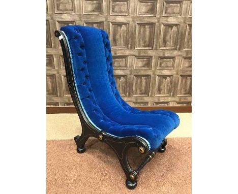 VICTORIAN EBONISED EMPIRE-STYLE NURSING CHAIRupholstered in cornflower blue button-back dralon