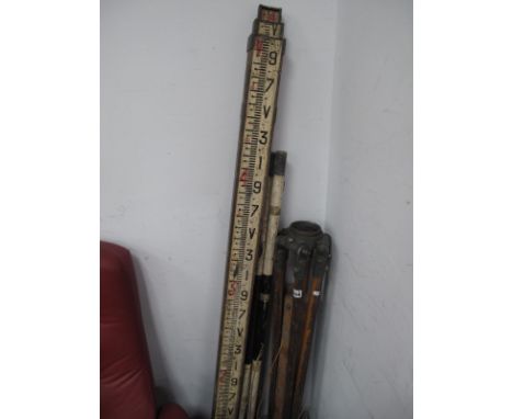 Surveyors Equipment, tripod, rulers.