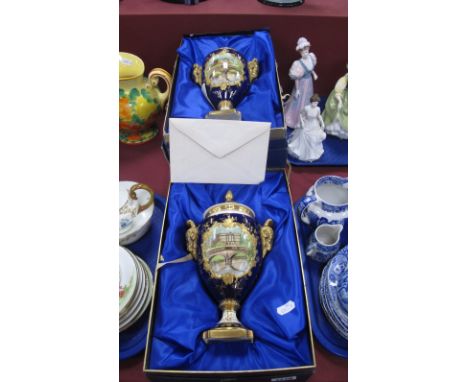 A Coalport Porcelain 'Chatsworth' Vase and Cover, of ovoid form with rams head handles, and acorn finial, and shaped square b