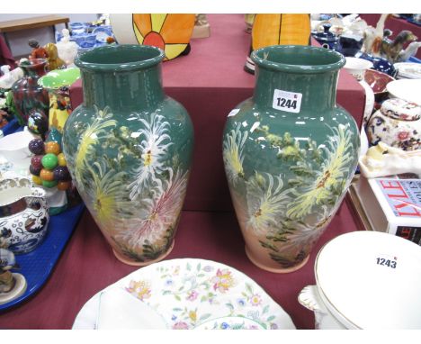 A Pair of Glazed Ceramic Vases, featuring chrysanthemums, 30cm high.