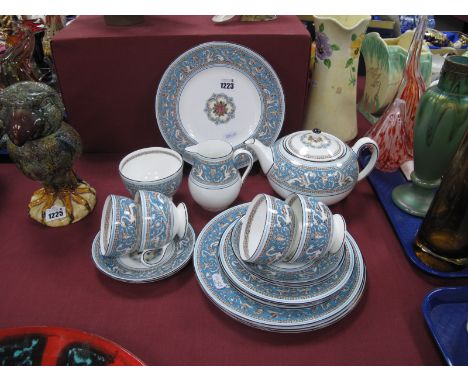 Wedgwood Florentine Turquoise Teapot, four dessert and four side plates, four cup and four saucers.