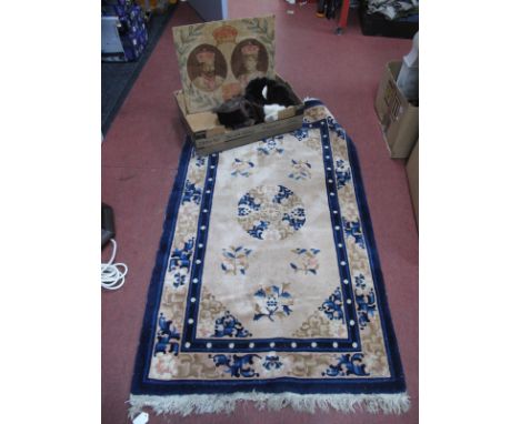 A Chinese Wool Tassled Rug, with floral motifs on beige ground 151 x 89cm, EVII tapestry furs:- One Box.