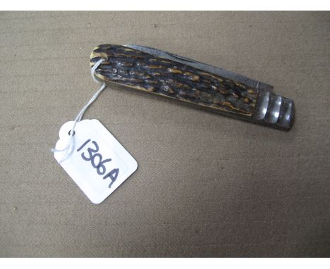 Taylor's Eye Witness Pocket Knife, the single blade stamped "Plimsoll the Sailors Friend", with stag scales, metal bolster, 1