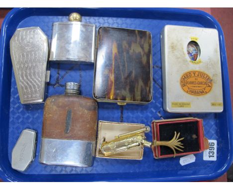 A Brass Sprouting Plant Badge, possibly Military hip flasks, coffin shaped snuff box etc:- One Tray.