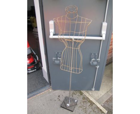 A Circa 1920's Shop Display Mannequin, with wired body.
