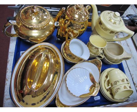 Wedgwood Matt Straw Coffee Service, of eleven pieces with gilt vine decoration, Worcester fireproof gilt table ware.