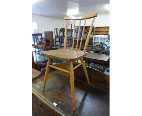 An Ercol Blonde elm and beech 608 model chair 