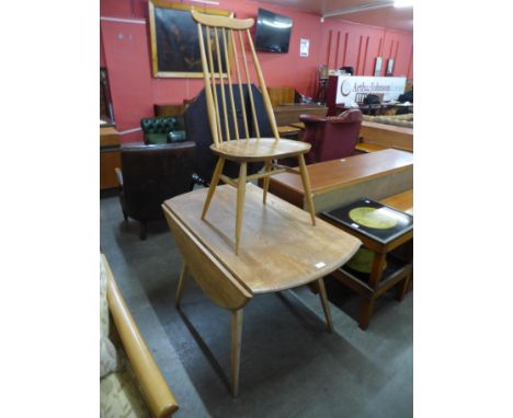 An Ercol Blonde elm and beech drop-leaf table and a Goldsmith chair 