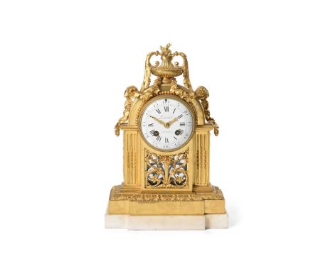 A LOUIS XVI ORMOLU AND WHITE MARBLE MANTEL CLOCK  CIRCA 1760-1780  The case in the manner of Robert Osmond, with floral urn a