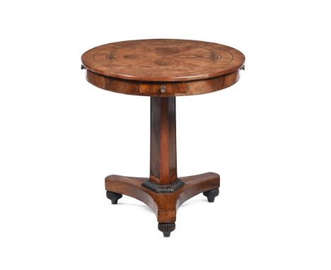 AN OLIVEWOOD AND CARVED 'DRUM' TABLE PROBABLY MALTESE, 19TH CENTURY Decorated with ebonised stringing, the top set to revolve