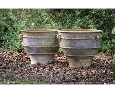 A LARGE PAIR OF TERRACOTTA PLANTERS  MODERN  Each of tapering circular form with small lug handles  approximately 57.5cm high