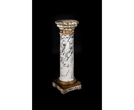 A FRENCH VARIAGATED WHITE MARBLE AND GILT METAL MOUNTED PEDESTAL COLUMN  SECOND HALF 19TH CENTURY 89cm high, the base 28 x 28