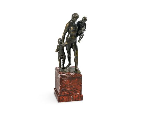 A BRONZE ALLEGORICAL GROUP EMBLEMATIC OF CHARITY  PROBABLY DUTCH, 17TH CENTURY  The female figure supporting a child in her l