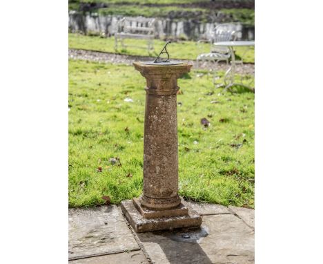 A COMPOSITION STONE SUNDIAL  20TH CENTURY  The dial inscribed 'Thou seeks the home but as thou walkhet speedeth fast away'  8