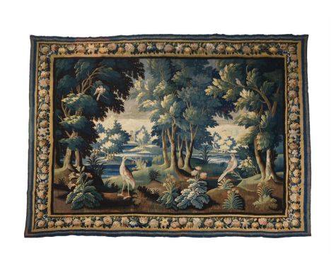 A FLEMISH VERDURE TAPESTRY  LATE 17TH OR EARLY 18TH CENTURY  Central field with river in verdant setting, birds in trees and 
