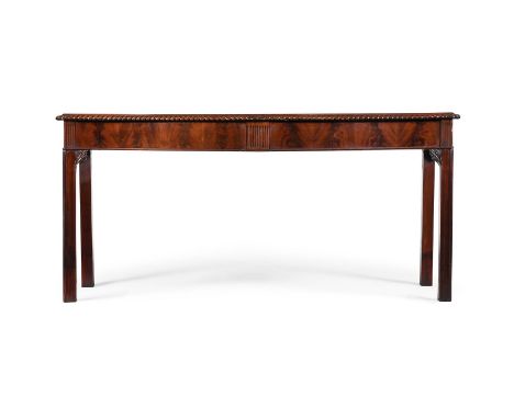 A MAHOGANY AND FUSTIC MAHOGANY SERPENTINE FRONTED SERVING TABLE FIRST HALF 19TH CENTURY One drawer with a brass retailers pla