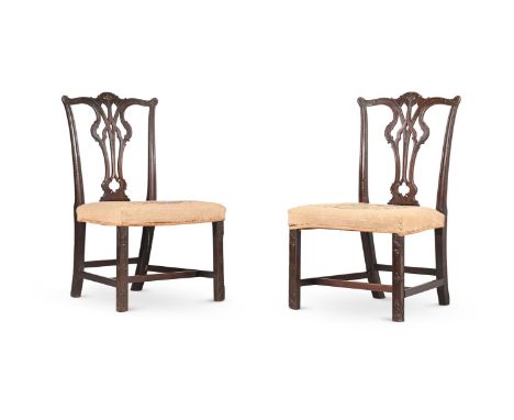 A PAIR OF GEORGE III MAHOGANY SIDE CHAIRS IN THE MANNER OF THOMAS CHIPPENDALE, CIRCA 1760  each 96cm high, 58cm wide, 57cm de