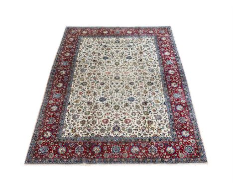 A TABRIZ CARPET  SIGNED BY MASTER WEAVER KHAYAM approximately 361 x 280cm   Condition Report:  Carpet with some minor wear co