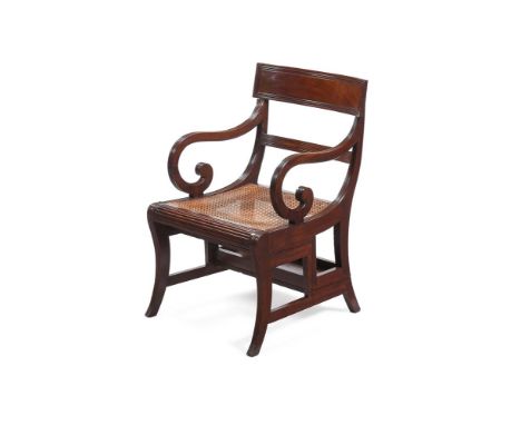 A REGENCY MAHOGANY METAMORPHIC ARMCHAIR IN THE MANNER OF MORGAN & SANDERS, CIRCA 1815 Converting to a flight of library steps