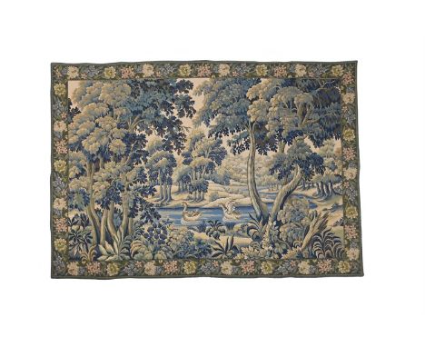 A LARGE VERDURE TAPESTRY  CONTEMPORARY  With central river with swans within verdant landscape, flowerhead border approximate