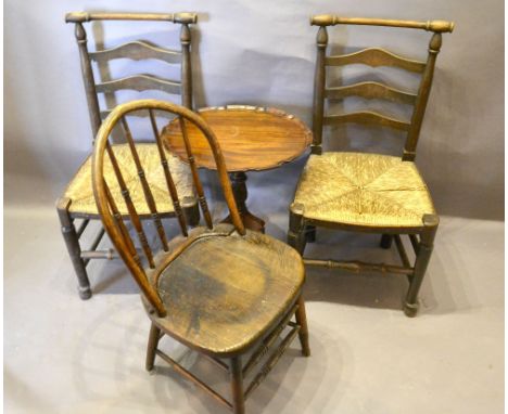 A Pair of Early 19th Century Ladder Back Dining Chairs, with rush seats raised upon turned legs with pad feet, together with 