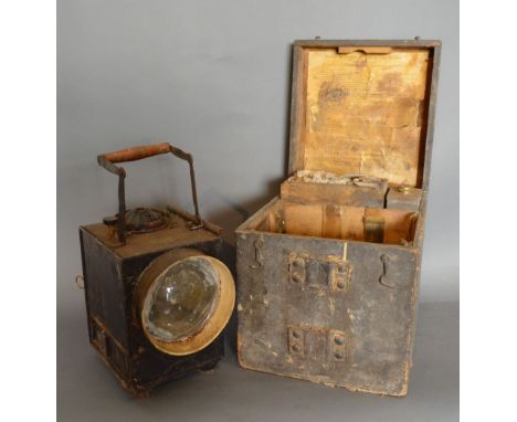 A Black Japaned Signalling Lamp by Siemens Bros. & Co. Ltd, London, number 5293, within original wooden case and with accesso