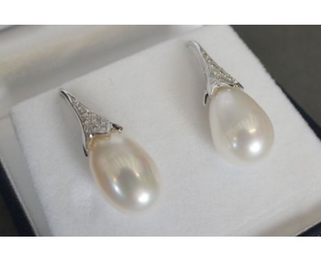 A Pair of Freshwater Pearl and Diamond Drop Earrings