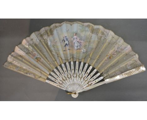 A 19th Century Gauze Leaf Fan, hand painted with a cartouche depicting a courting couple catching butterflies, the mother of 