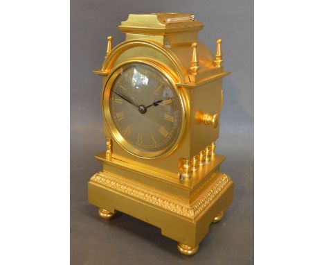 A 19th Century Ormolu Cased Mantle Clock, the case of architectural form, the silvered dial with Roman numerals and two train