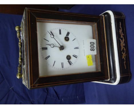 ~ A 19th century rosewood inlaid striking mantel clock