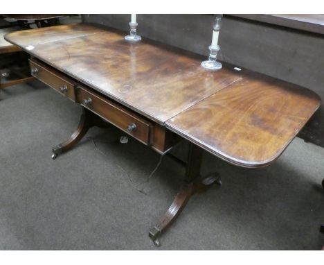 George III style mahogany sofa table with two frieze drawers and brass capped feet with castors; and a pair of cut glass cand