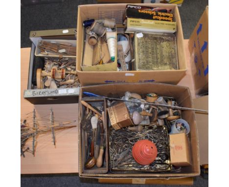 Assorted sewing tools, embroidery tools, clamps, embroidery hoops, scissors, wooden lace bobbins, threads, two leather hole p