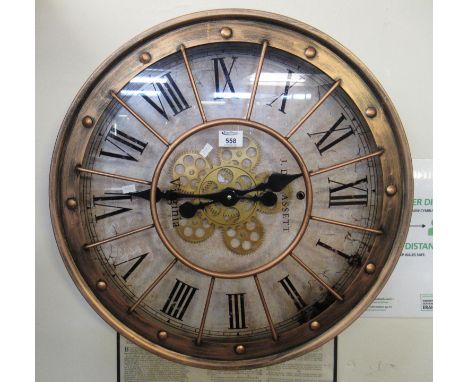 Modern battery operated skeleton faced type industrial design wall clock.(B.P. 21% + VAT) 