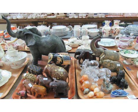 Two trays of elephant figures to include; treen, candle, metal, glass etc, together with The Leonardo Collection 'Cats and Ki