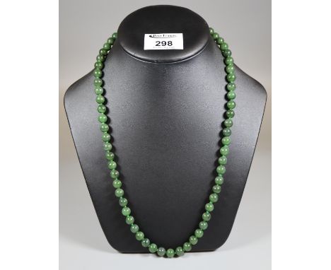 A string of jade beads.(B.P. 21% + VAT) 