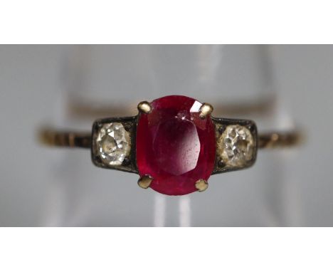 18ct gold ruby and diamond three stone ring. Ring size O & 1/2. Approx weight 1.8 grams. (B.P. 21% + VAT) Probable 1930s/40s.