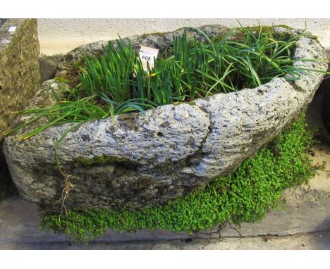 Weathered composition stone planter with plants.(B.P. 21% + VAT) 