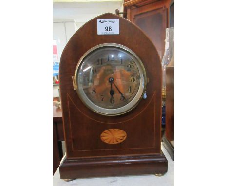 Edwardian inlaid mahogany lancet-shaped mantel clock. With pendulum. 32cm high approx. (B.P. 21% + VAT) 