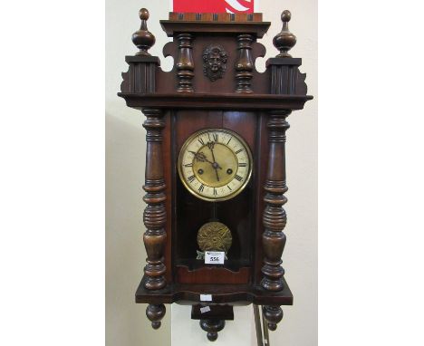 Early 20th Century Vienna type walnut two train wall clock, with key and pendulum.(B.P. 21% + VAT) 