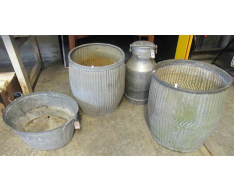Collection of galvanised vintage items to include; a pair of fluted tubs or planters, milk churn and a two handled tub. (4) (