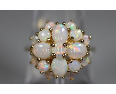 9ct gold opal cluster ring.  Ring size N&1/2. Approx weight 4.2 grams.(B.P. 21% + VAT) 