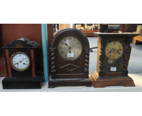 Late Victorian black slate and marble two train architectural mantel clock with white enameled Roman dial and French drum mov