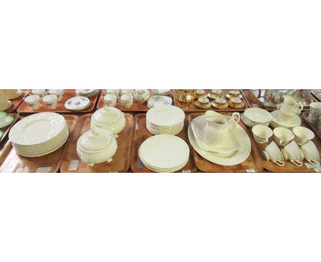 Five trays of Wedgwood of Etruria and Barlaston dinnerware in cream with an embossed floral pattern to include: a selection o