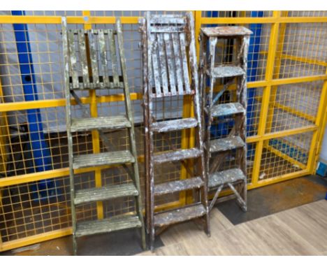 3 sets of vintage wooden step ladders each with top platform