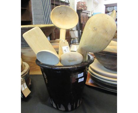 Glazed terracotta pot containing various vintage treen kitchenalia to include; various spoons, cawl spoons, carved spoons and